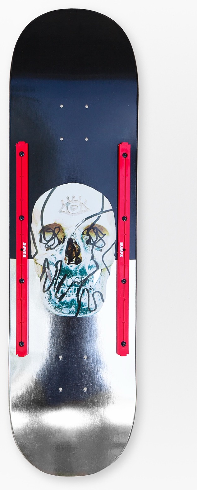 Red BUMPS rails mounted on a skull graphic deck